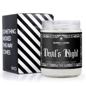 Devil's Night Scented Candle with Black Label with spiderweb boarder and white text in gothic font