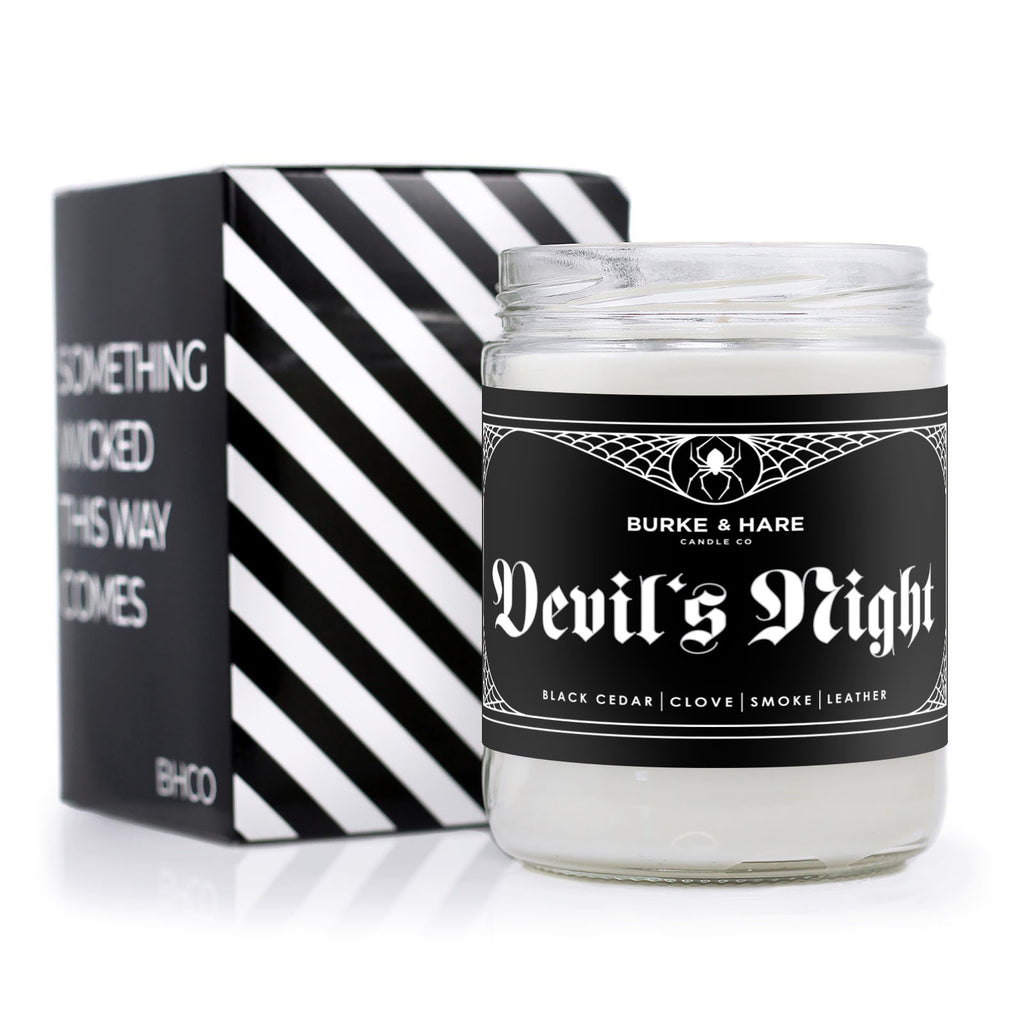 Devil's Night Scented Candle with Black Label with spiderweb boarder and white text in gothic font