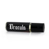 vampire themed perfume oil in a glass roller vial with a black label that says Dracula in gothic font