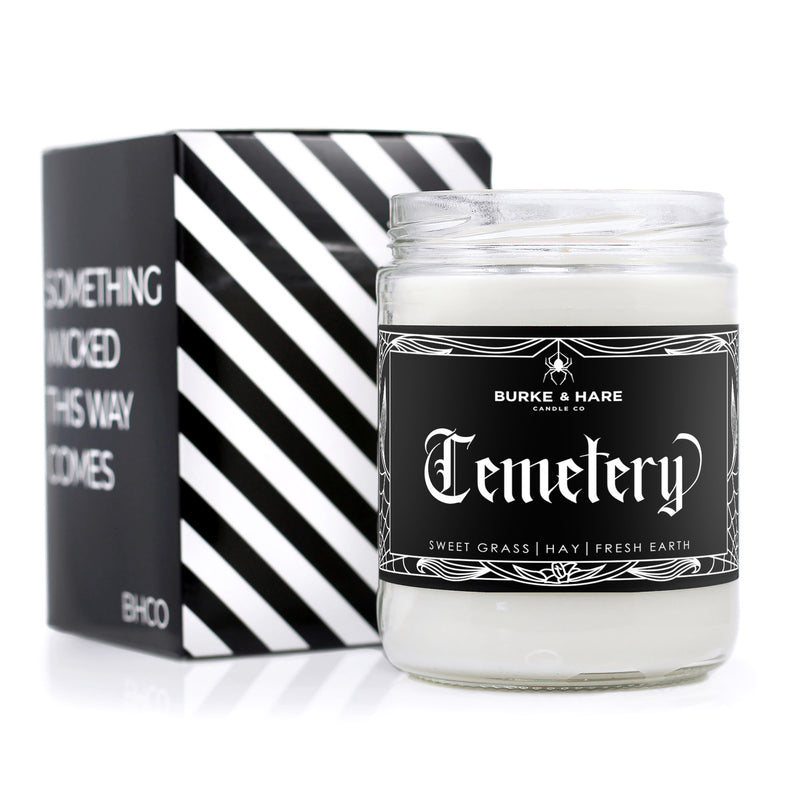 graveyard scented candle with a cemetery on label that says Cemetery Gates