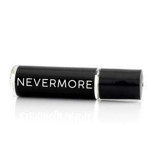 Nevermore perfume oil in a roller vial with a black label and white text