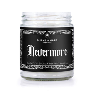 Nevermore scented candle. Poe inspired candle with black label and spiderweb border that reads Nevermore in gothic font.