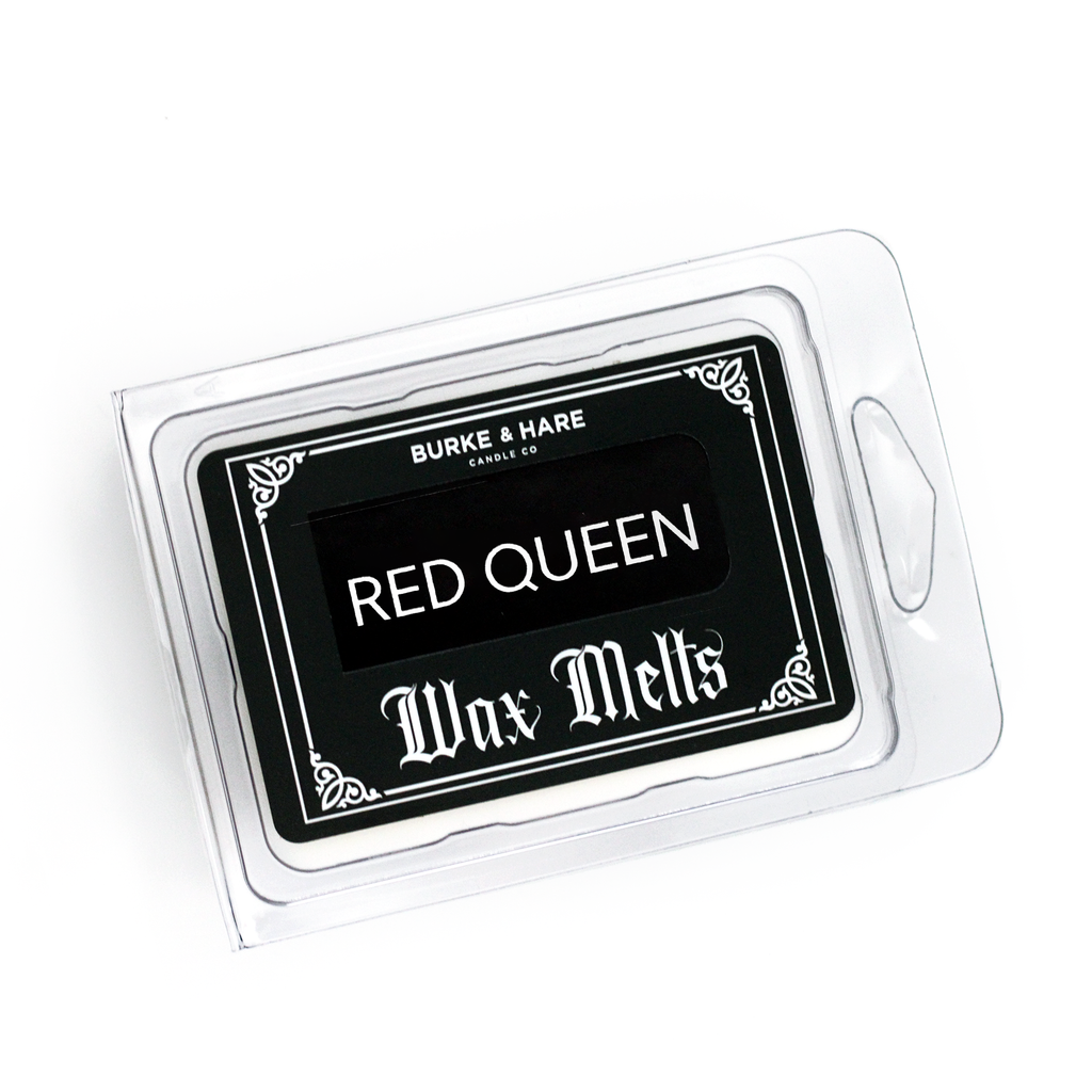 Witchy Wax melts in a clear clamshell case with a black label that says the Red Queen in gothic font