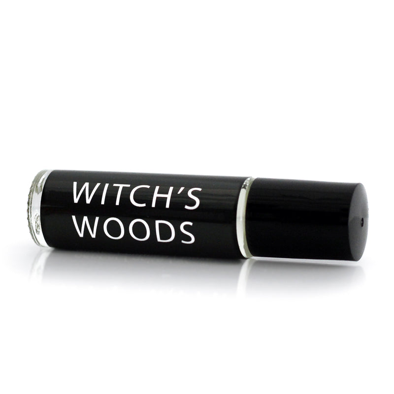 Gothic Perfume oil in a roller vial with a  black label and white text that says 