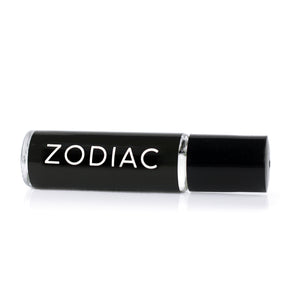 patchouli scented perfume oil in a roll on vial with a black label that reads Zodiac in white font