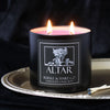 rose scented candle in black tin with a label that has a rose on it and says "altar" in white text 