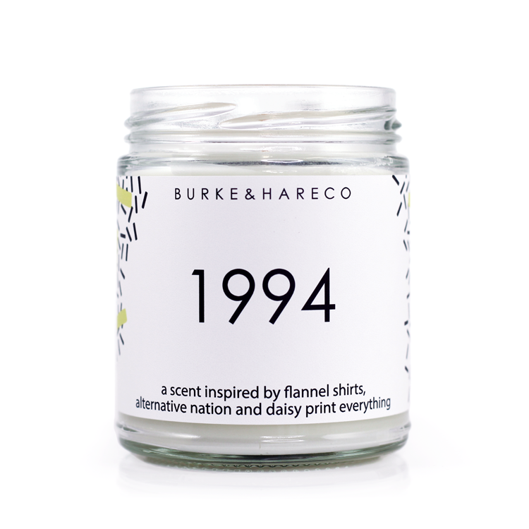 90s inspired scented candle with white label and nostalgic pattern
