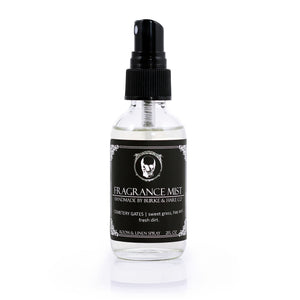 Cemetery Scented Room Mist in a glass bottle with a black label that reads "Cemetery Gates" in white font. Label features skull logo.