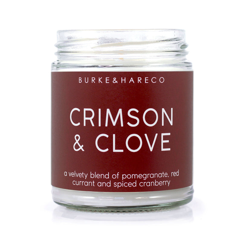 Clove scented candle with crimson label